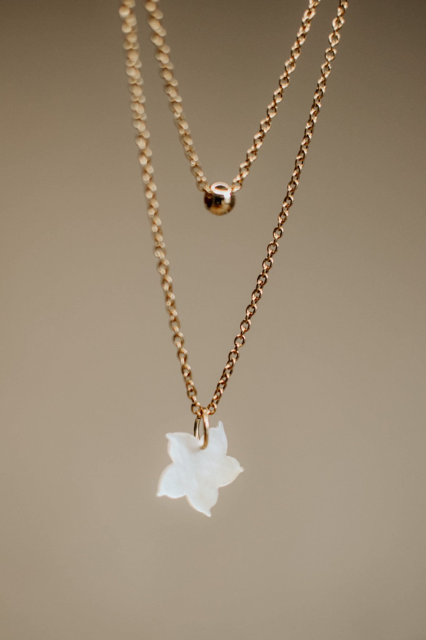 Dini in Mother of Pearl 16"